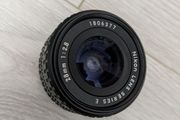 Nikon Series E 28mm f/2.8 manual focus wide-angle prime lenses.