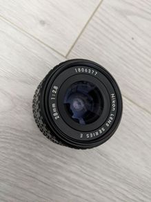 Nikon Series E 28mm f/2.8 manual focus wide-angle prime lenses.
