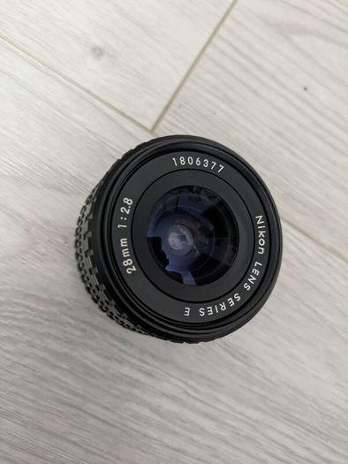 Nikon Series E 28mm f/2.8 manual focus wide-angle prime lenses.