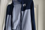 Tracksuit = Under Armour.