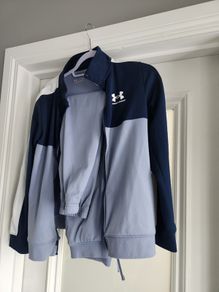 Tracksuit = Under Armour.