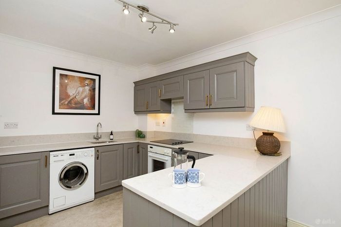 Kitchen with Quartz Countertop, Includes Some Appliances