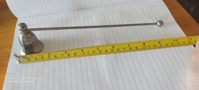 Candle metal snuffer ,,good patina for its age ,sold as seen