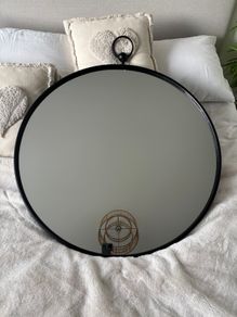 Beautiful black framed round mirror