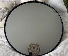 Beautiful black framed round mirror