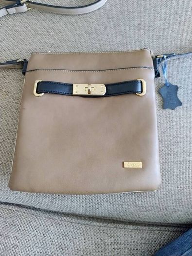 Liberty by Gionni genuine leather handbag in very good condition with lots of pockets zipped closures and adjustable shoulder strap one small mark see fourth last photo and see last three photos for exact measurements FREE TRACKED POSTAGE INCLUDED
