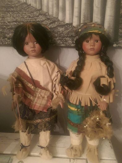 Pair of Indians porcelain doll s