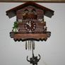 Wall Clock - the figures in the upper part of the clock are constantly moving - in working order Image 2