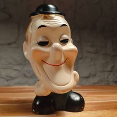A lovely charming chalkware caricature bust of Stan Laurel 1950s