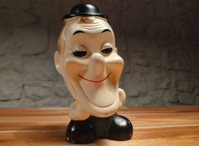 A lovely charming chalkware caricature bust of Stan Laurel 1950s