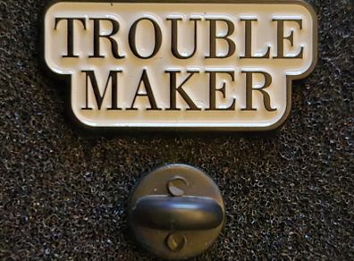 Trouble maker ! pin back badge.