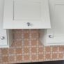Kitchen including integrated dishwasher and cooker Image 9