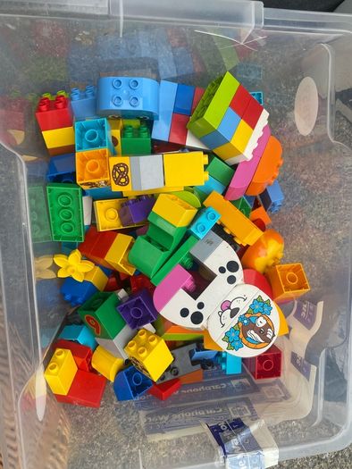 Box of Lego. 4 Figures and 4 Small Base Plates
