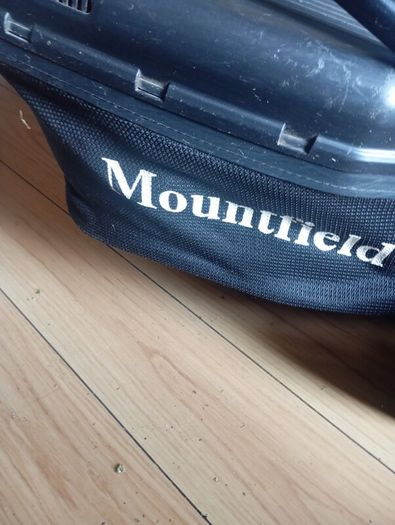 Mount field petrol lawnmower