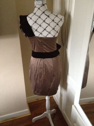 Beautiful one shoulder tan dress with black velvet ruffle on shoulder