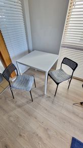 Enter a catchy titleIKEA table, 75x75x74 with 2 chairs. Seat covers included for FREE!