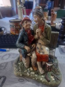 Vintage 1972 Naturecraft Stoneware Figurine, Titled Celebration, depicting an elderly couple sitting on a bench