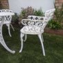 Ornate cast iron garden table and 4chairs Image 4