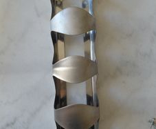 Wine holder (attaches to wall)