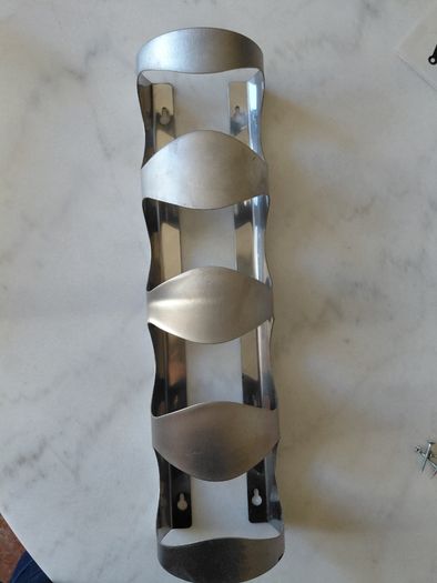 Wine holder (attaches to wall)