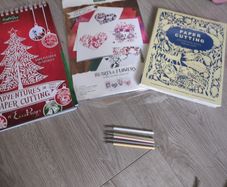 Paper cutting kit and reference book