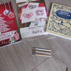 Paper cutting kit and reference book