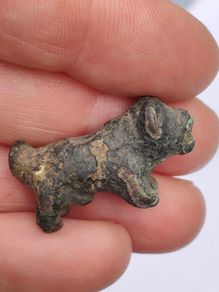 Iron Age Bronze lion with certs and License