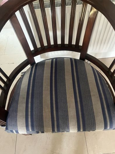 Traditional dark wooden chair with blue/grey cushion for office or study