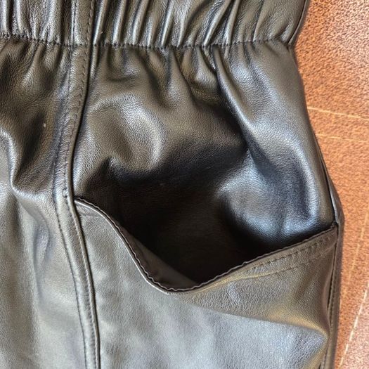 Black leather shorts, size 10