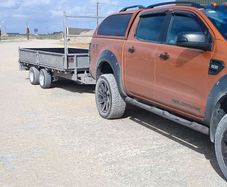 5x12 flat bed with side and ramps 2750 kg rated