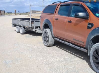 5x12 flat bed with side and ramps 2750 kg rated