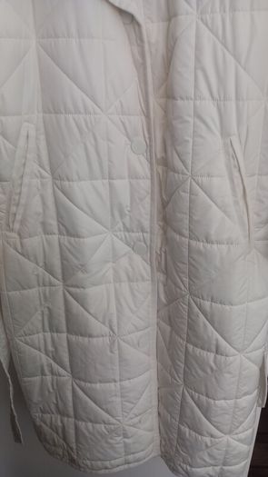 Capsule White Quilted Longline Coat.