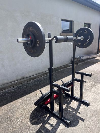 Gym equipment (squat rack/ bench / barbell + weights)