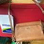 dune brown or tan crossbody bag. Good condition. Image 2