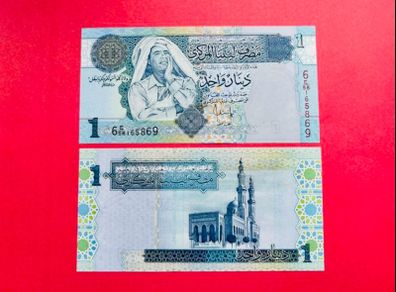 Libya. 1  Dinar  2004  Pick 68b. Gaddafi   ( Uncirculated )