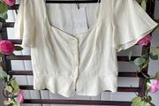 blouse Bnwt cream bell sleeve button front size large