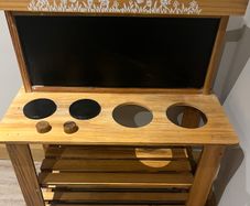 Toy outdoor kitchen