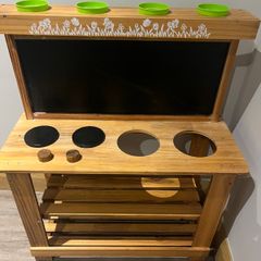 Toy outdoor kitchen