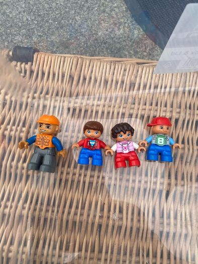 Box of Lego. 4 Figures and 4 Small Base Plates