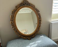 Oval gilt antique bevelled mirrors
