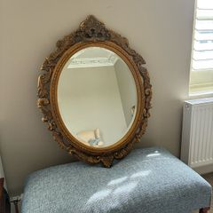 Oval gilt antique bevelled mirrors