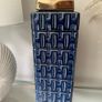 Blue and gold square lidded jar. Image 4