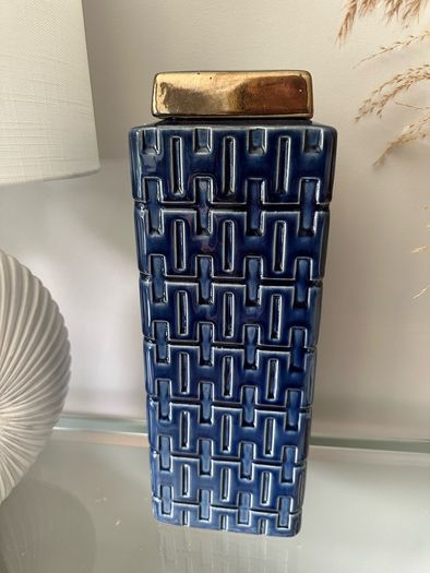 Blue and gold square lidded jar.