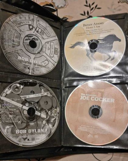 80 CD + Case. All CD's in perfect playable condition.