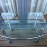 glass TV stand with wheels Image 2