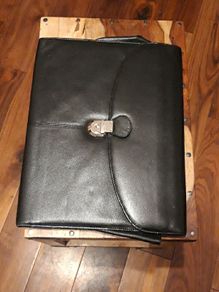 A4 Document Folder. Like new.used few times. It has lock tight with  it. Big space inside and wallet/purse.