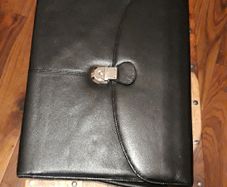 A4 Document Folder. Like new.used few times. It has lock tight with  it. Big space inside and wallet/purse.