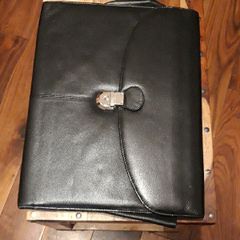 A4 Document Folder. Like new.used few times. It has lock tight with  it. Big space inside and wallet/purse.