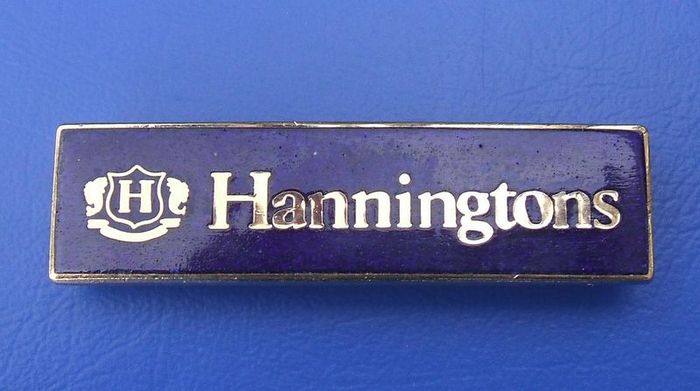 HANNINGTONS (Manhattan Windsor Ltd) - a retail assistant's badge of Hanningtons department stores, Brighton (1970's - 1990's)