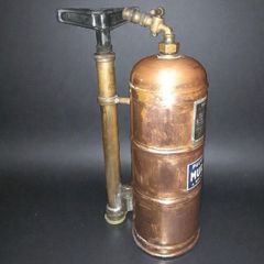 Antique copper fire extinguisher